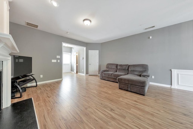 living room featuring light wood-type flooring