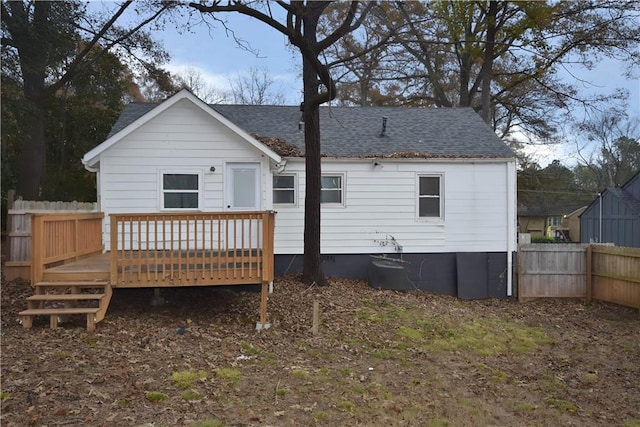 rear view of property with a deck