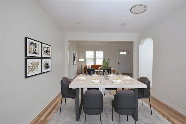 dining room with light wood-type flooring