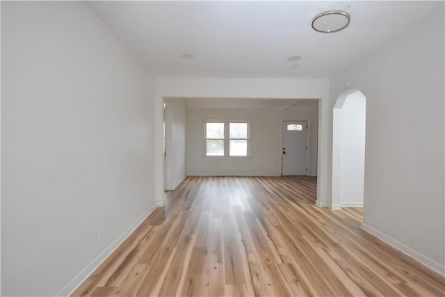 empty room with light hardwood / wood-style floors