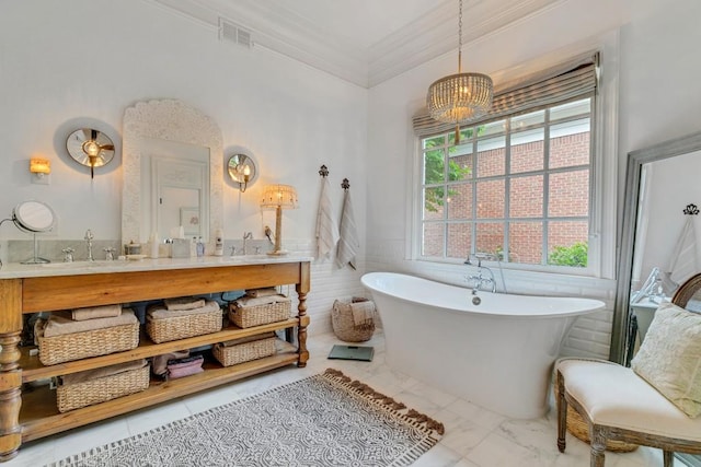 bathroom with vanity, crown molding, a bath, and tile patterned flooring