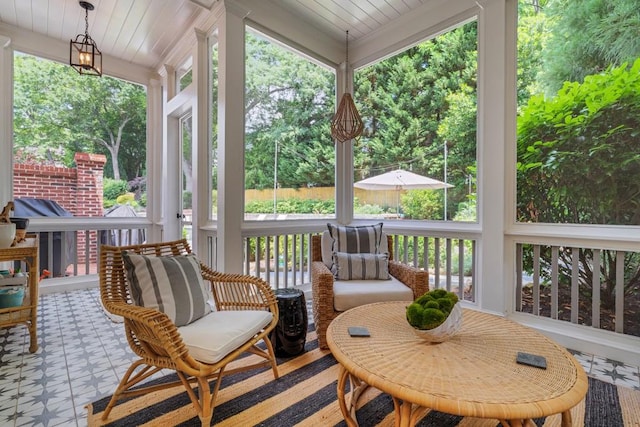 sunroom / solarium with a healthy amount of sunlight