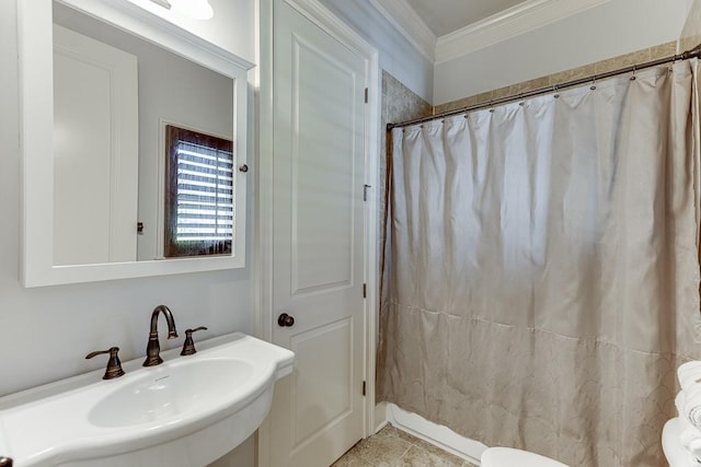 bathroom featuring sink, crown molding, tile patterned flooring, toilet, and a shower with shower curtain