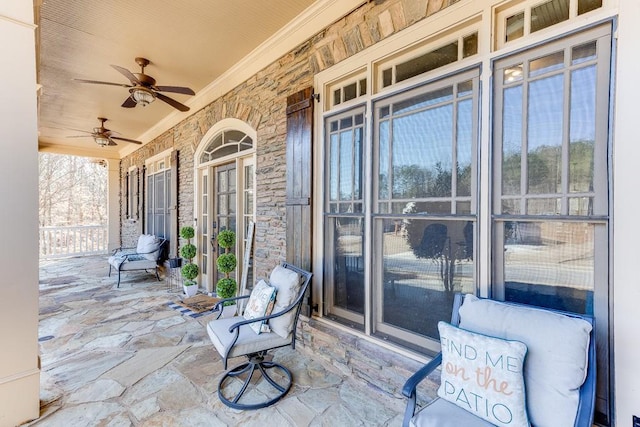 view of patio / terrace featuring ceiling fan