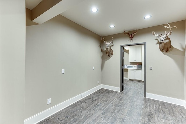 spare room featuring light hardwood / wood-style flooring