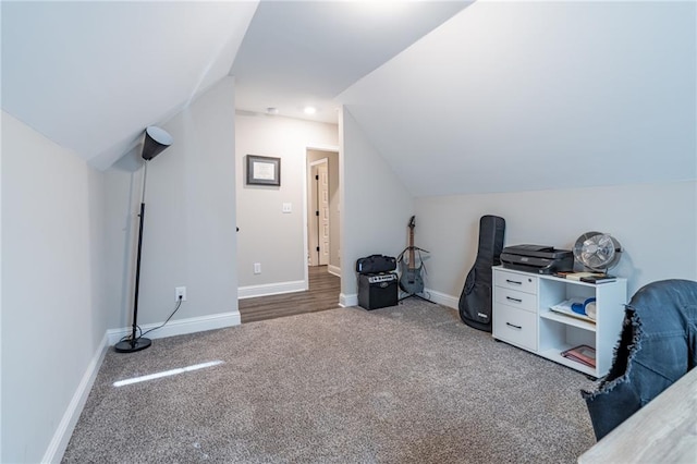 bonus room featuring carpet flooring and lofted ceiling