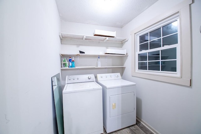 178 Wayne St SW, Calhoun, GA 30701 - washroom featuring washing machine and dryer, a textured ceiling, wood finished floors, and baseboards