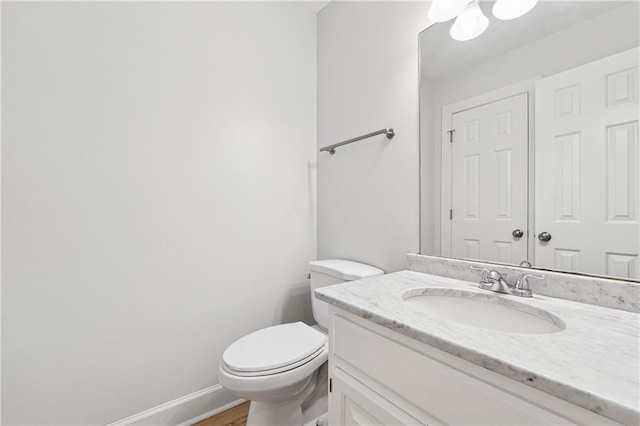 kitchen with sink, ceiling fan, appliances with stainless steel finishes, white cabinetry, and decorative backsplash