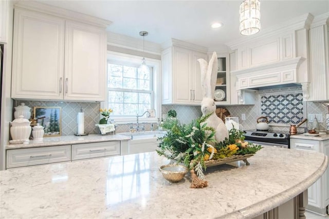3 Westridge Pl, Rome, GA 30165 - kitchen featuring stainless steel electric range, white cabinetry, hanging light fixtures, light stone countertops, and decorative backsplash