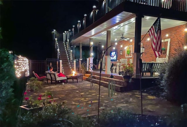 3 Westridge Pl, Rome, GA 30165 - patio at night with ceiling fan and an outdoor fire pit
