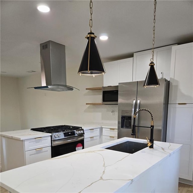 kitchen featuring extractor fan, stainless steel appliances, white cabinetry, light stone countertops, and pendant lighting