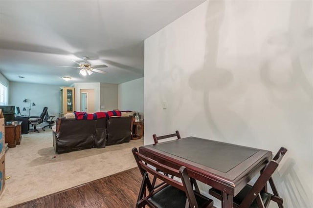 dining area featuring ceiling fan and light wood-type flooring