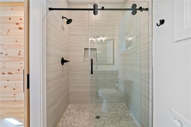 bathroom featuring an enclosed shower