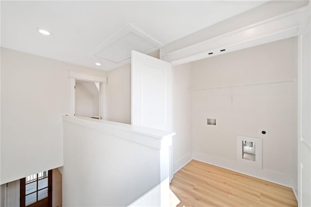 laundry room featuring hardwood / wood-style flooring, hookup for a washing machine, and electric dryer hookup