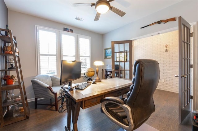 office space featuring dark hardwood / wood-style flooring and ceiling fan