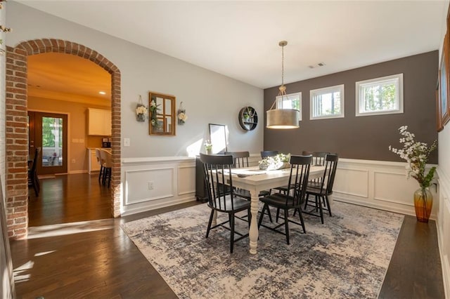 dining room with dark wood-type flooring