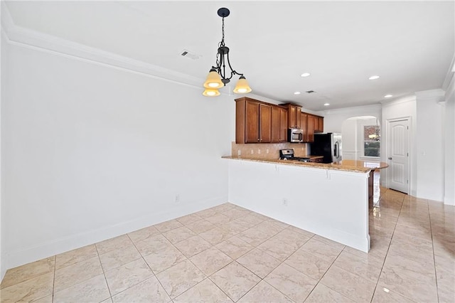 kitchen featuring a notable chandelier, kitchen peninsula, crown molding, decorative backsplash, and appliances with stainless steel finishes