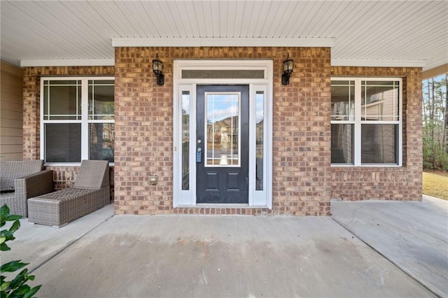 property entrance with covered porch