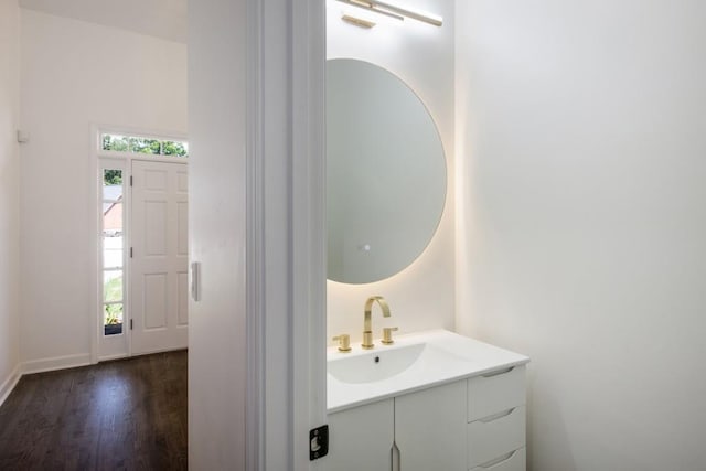 bathroom featuring vanity and wood-type flooring