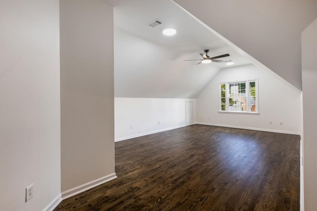 bonus room with vaulted ceiling, dark hardwood / wood-style flooring, and ceiling fan