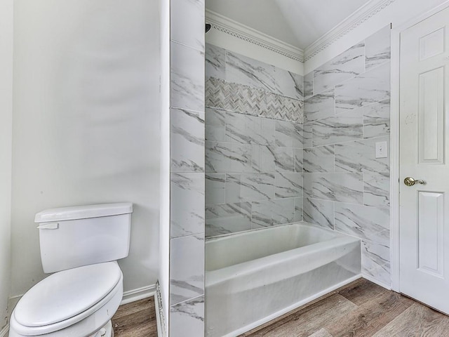 bathroom with crown molding, hardwood / wood-style floors, and toilet