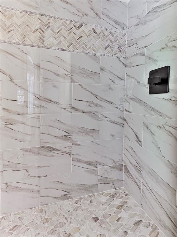 details featuring a tile shower