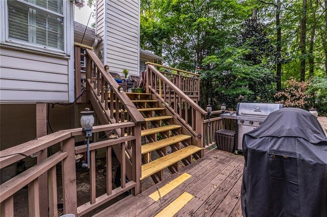 wooden deck with area for grilling