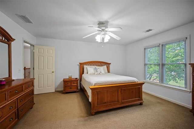385 Guildhall Grv, Johns Creek, GA 30022 - bedroom with light carpet, baseboards, and a ceiling fan