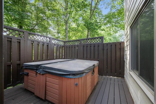385 Guildhall Grv, Johns Creek, GA 30022 - wooden terrace featuring a hot tub and fence