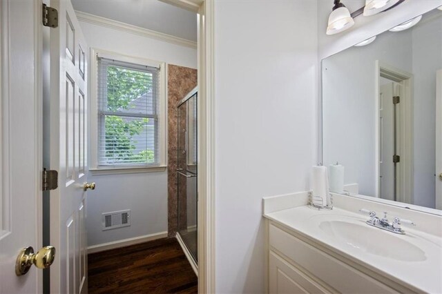 385 Guildhall Grv, Johns Creek, GA 30022 - full bathroom with a shower stall, vanity, ornamental molding, wood finished floors, and baseboards