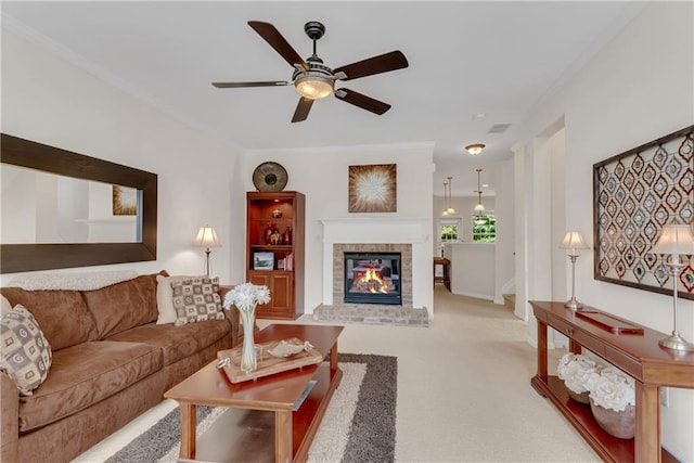 3733 Chattahoochee Summit Dr SE Unit 7, Atlanta, GA 30339 - carpeted living room with a ceiling fan, a brick fireplace, and ornamental molding