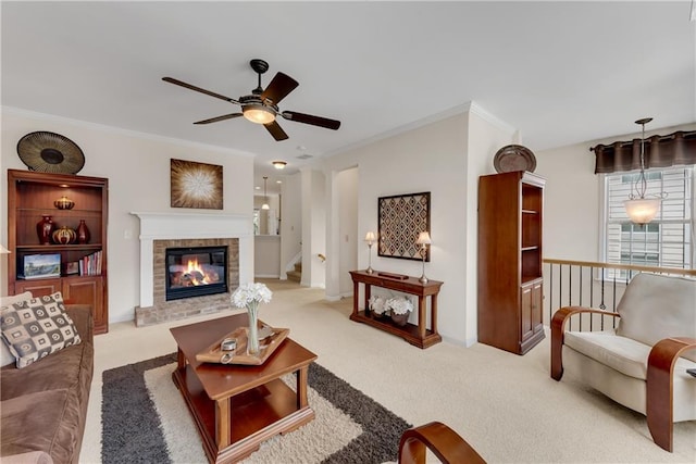 3733 Chattahoochee Summit Dr SE Unit 7, Atlanta, GA 30339 - living room featuring a ceiling fan, light colored carpet, crown molding, a brick fireplace, and stairs