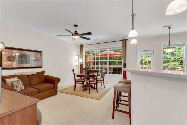 3733 Chattahoochee Summit Dr SE Unit 7, Atlanta, GA 30339 - carpeted living room featuring crown molding and a ceiling fan