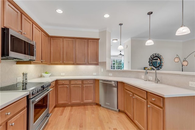 3733 Chattahoochee Summit Dr SE Unit 7, Atlanta, GA 30339 - kitchen featuring appliances with stainless steel finishes, a peninsula, crown molding, light wood-style floors, and backsplash