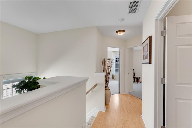 3733 Chattahoochee Summit Dr SE Unit 7, Atlanta, GA 30339 - hallway with an upstairs landing and light wood-type flooring