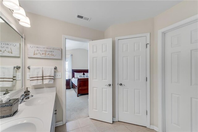 3733 Chattahoochee Summit Dr SE Unit 7, Atlanta, GA 30339 - bathroom with double vanity, tile patterned floors, and ensuite bath
