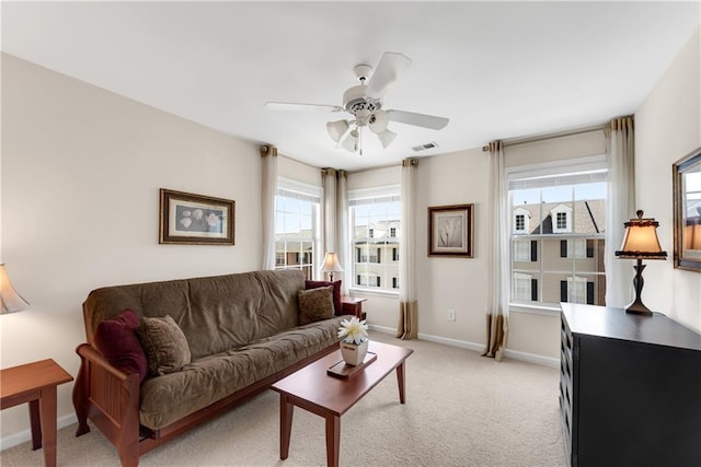 3733 Chattahoochee Summit Dr SE Unit 7, Atlanta, GA 30339 - living room featuring healthy amount of natural light, light colored carpet, and ceiling fan