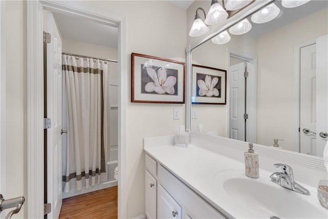 3733 Chattahoochee Summit Dr SE Unit 7, Atlanta, GA 30339 - full bathroom featuring vanity, shower / tub combo with curtain, and wood finished floors