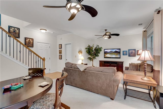 3733 Chattahoochee Summit Dr SE Unit 7, Atlanta, GA 30339 - living area with a ceiling fan, stairway, light colored carpet, and crown molding