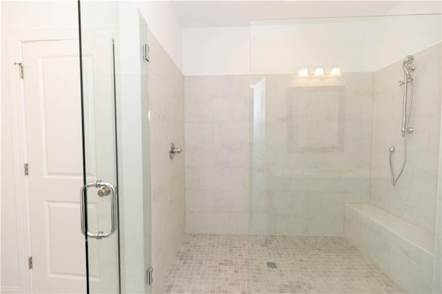 bathroom featuring an enclosed shower