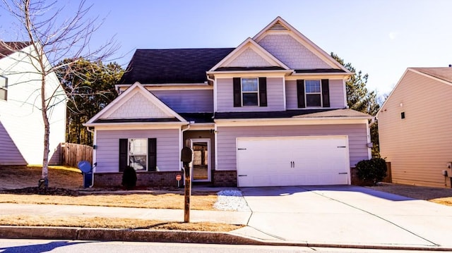 craftsman house with a garage