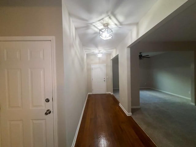 hall with dark carpet