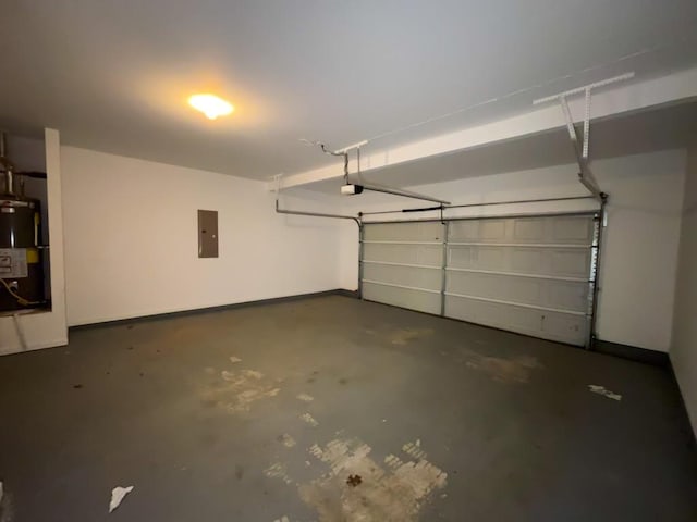 garage featuring a garage door opener and electric panel