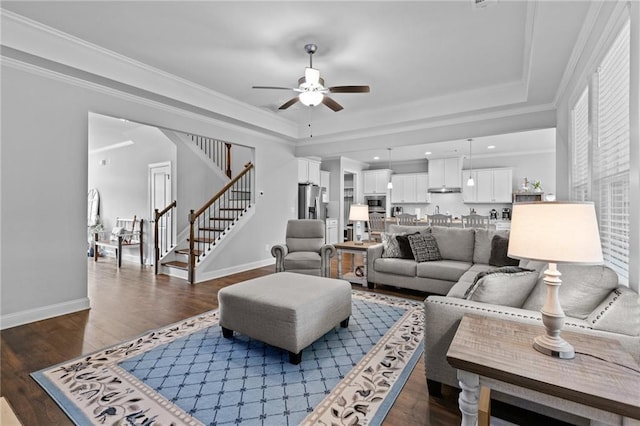 5116 Chastain Way, Gainesville, GA 30507 - living area featuring stairway, a ceiling fan, ornamental molding, a tray ceiling, and baseboards
