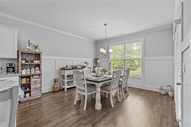 5116 Chastain Way, Gainesville, GA 30507 - dining room with a chandelier, ornamental molding, dark wood-style flooring, and a decorative wall