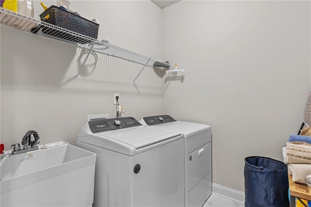 5116 Chastain Way, Gainesville, GA 30507 - washroom featuring washing machine and dryer, baseboards, and light marble finish flooring