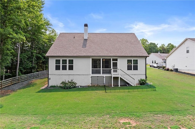 5116 Chastain Way, Gainesville, GA 30507 - rear view of property featuring a chimney, a sunroom, stairway, and a shingled roof