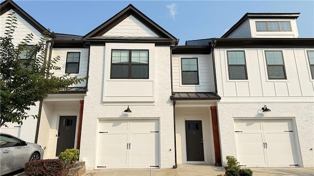 32 S Auburn Landing Pl, Auburn, GA 30011 - view of property featuring a garage and brick siding