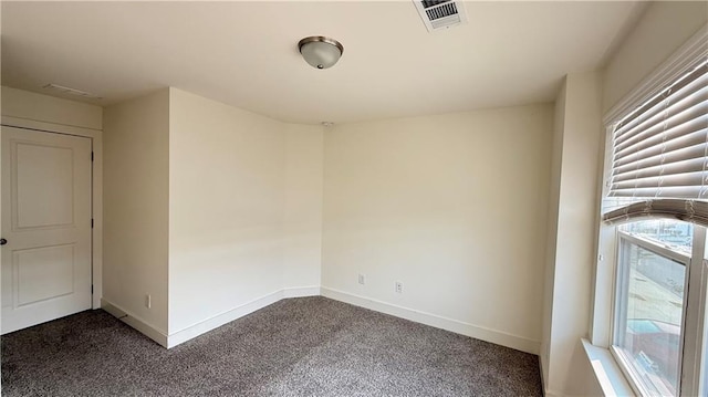 32 S Auburn Landing Pl, Auburn, GA 30011 - empty room featuring dark colored carpet and baseboards