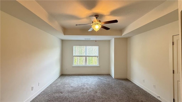 32 S Auburn Landing Pl, Auburn, GA 30011 - carpeted empty room featuring a raised ceiling, a ceiling fan, and baseboards